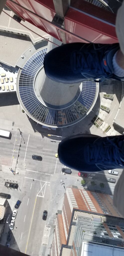 Another view of the glass floor on the Calgary Tower over looking the street 517 feet below my feet.