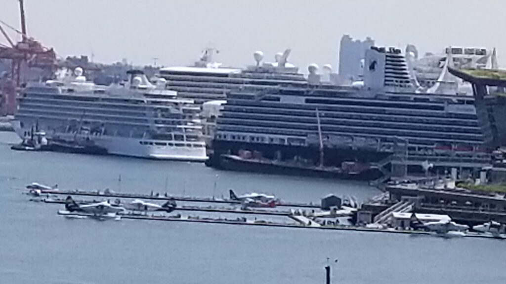 Cruise ships in the Vancouver harbor and a seaplane facility as well.