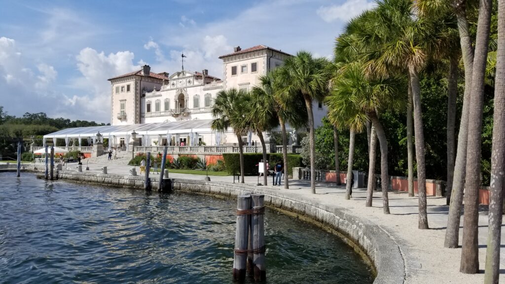 Seeing Vizcaya is another excellent thing to do in Miami. We are looking at a water view of the mansion.