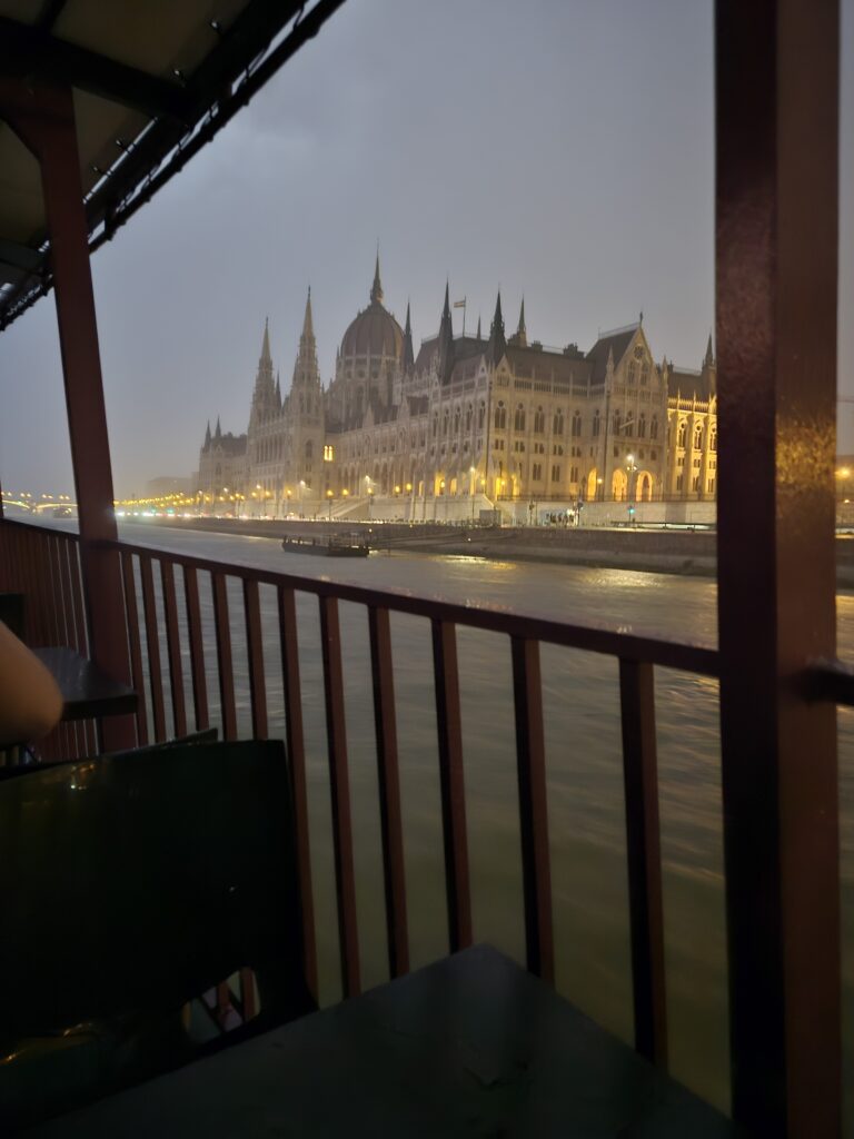 Viewing the Parliament Building from our nightime Danube River Cruise in Budapest, Hungary.