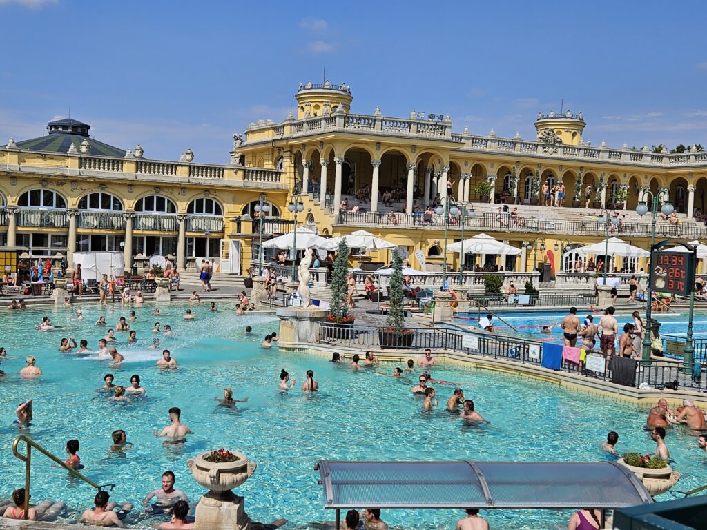 Bathers in the pool at the Szechenyi Thermal Baths and Pools in Budapest, Hungary.